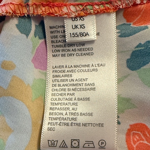 Free People Tied To You Tank in the "Fiesta Combo" colorway. - Picture 10 of 11